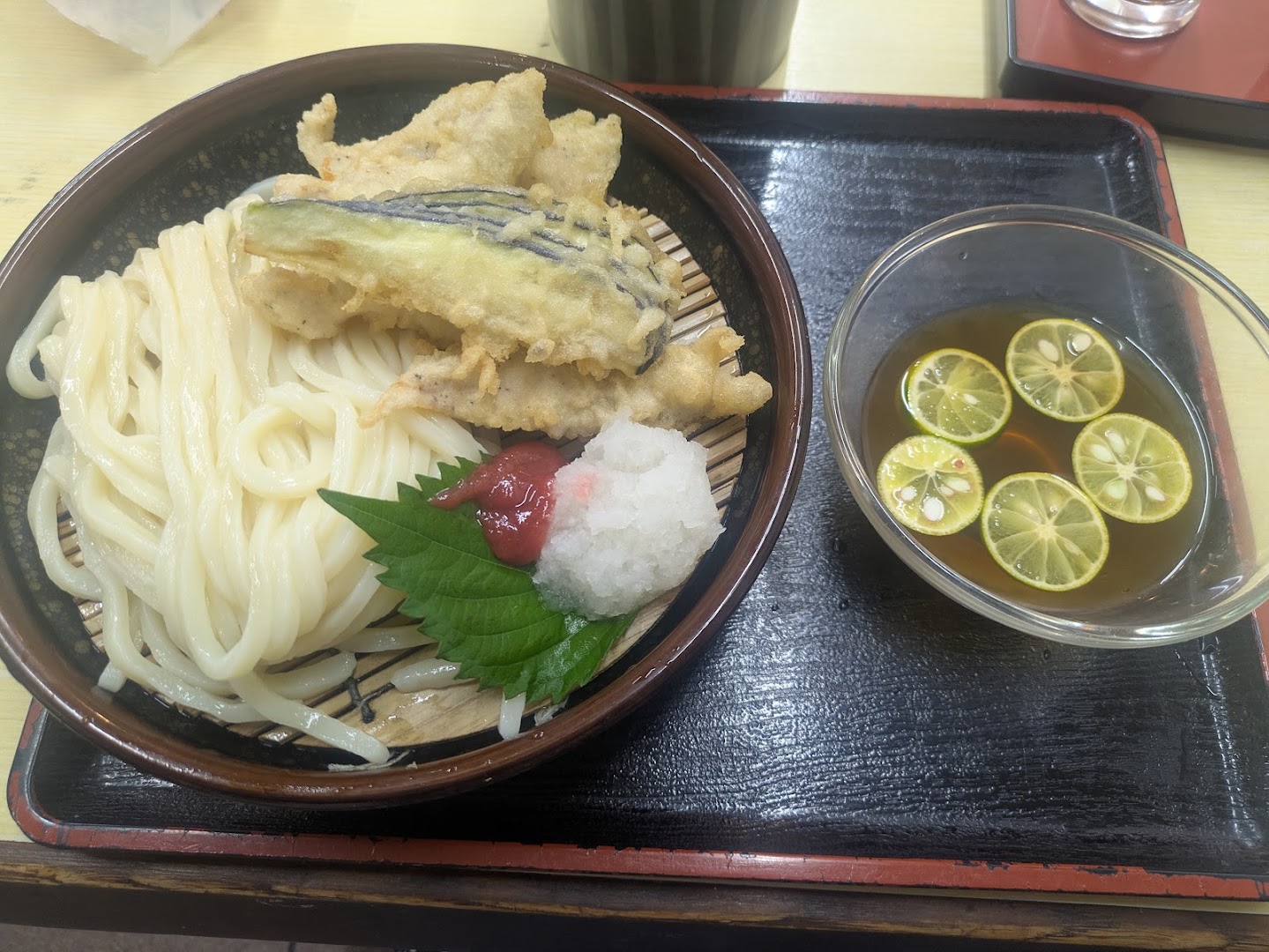 Sudachi zaru udon with vegetable tempura, chicken tempura, grated daikon, shiso and plum at Udon Ichiba