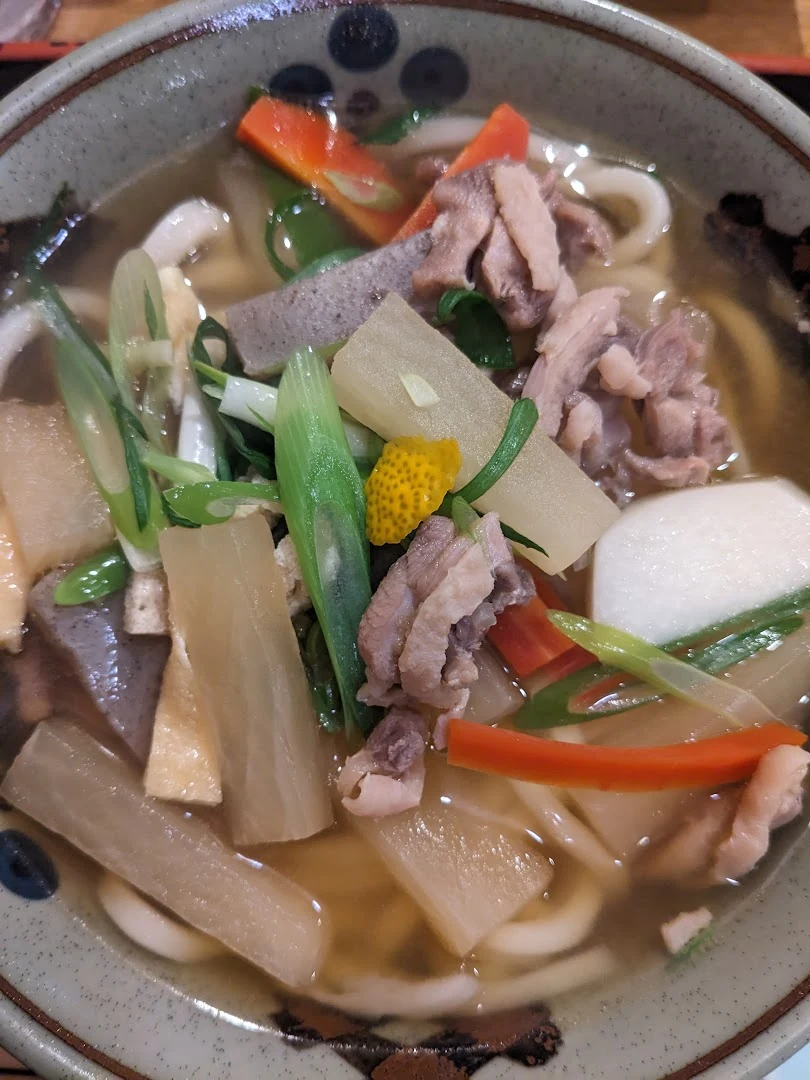 Shippoku udon with meat, vegetables, konnyaku and yuzu